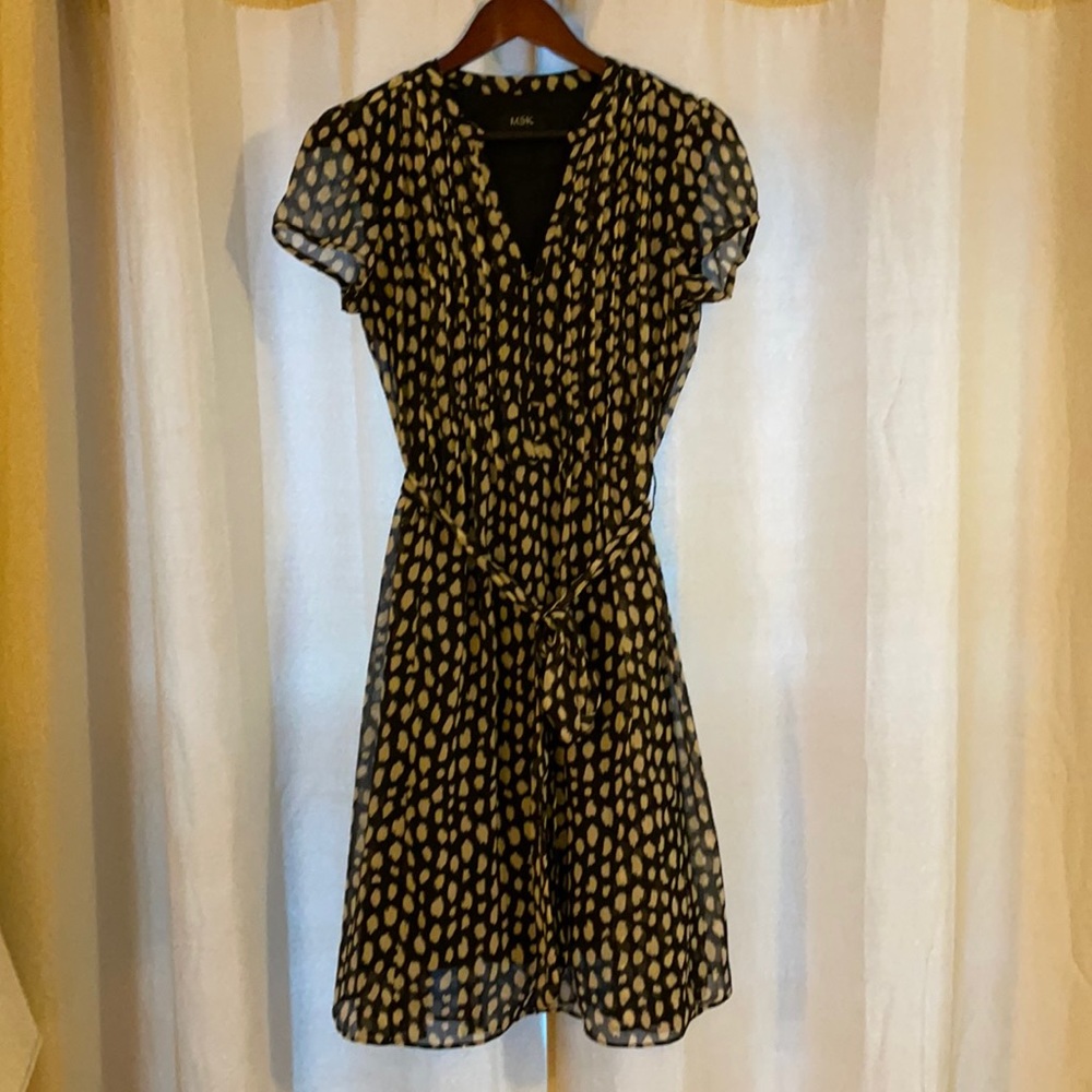 Cap sleeve fit and flare dress with pin tuck detail and sash. Size 6